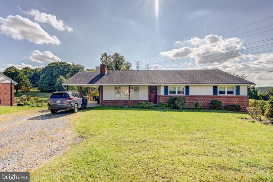 Fantastic brick rancher on almost two acres in Baltimore County! Main level features three spacious bedrooms, two full baths and wood burning fireplace. Finished Lower level with full bath, separate entrance, another wood burning fireplace, and space for bedrooms could easily be used as in-law apartment—windows and walk out sliders provide loads of natural light. Other highlights include updated electric panel (2024), relined chimneys (2004), HVAC upgraded (2017), updated gas boiler (2004). HUGE outdoor space includes covered parking under carport, shed, mature landscaping, fencing, rear patio, and covered front porch. Property zoned DR 3.5-buyer should confirm possible subdivision with county. Super convenient to I-695, I-95,  White Marsh, Perry Hall, Towson, & Downtown Baltimore.