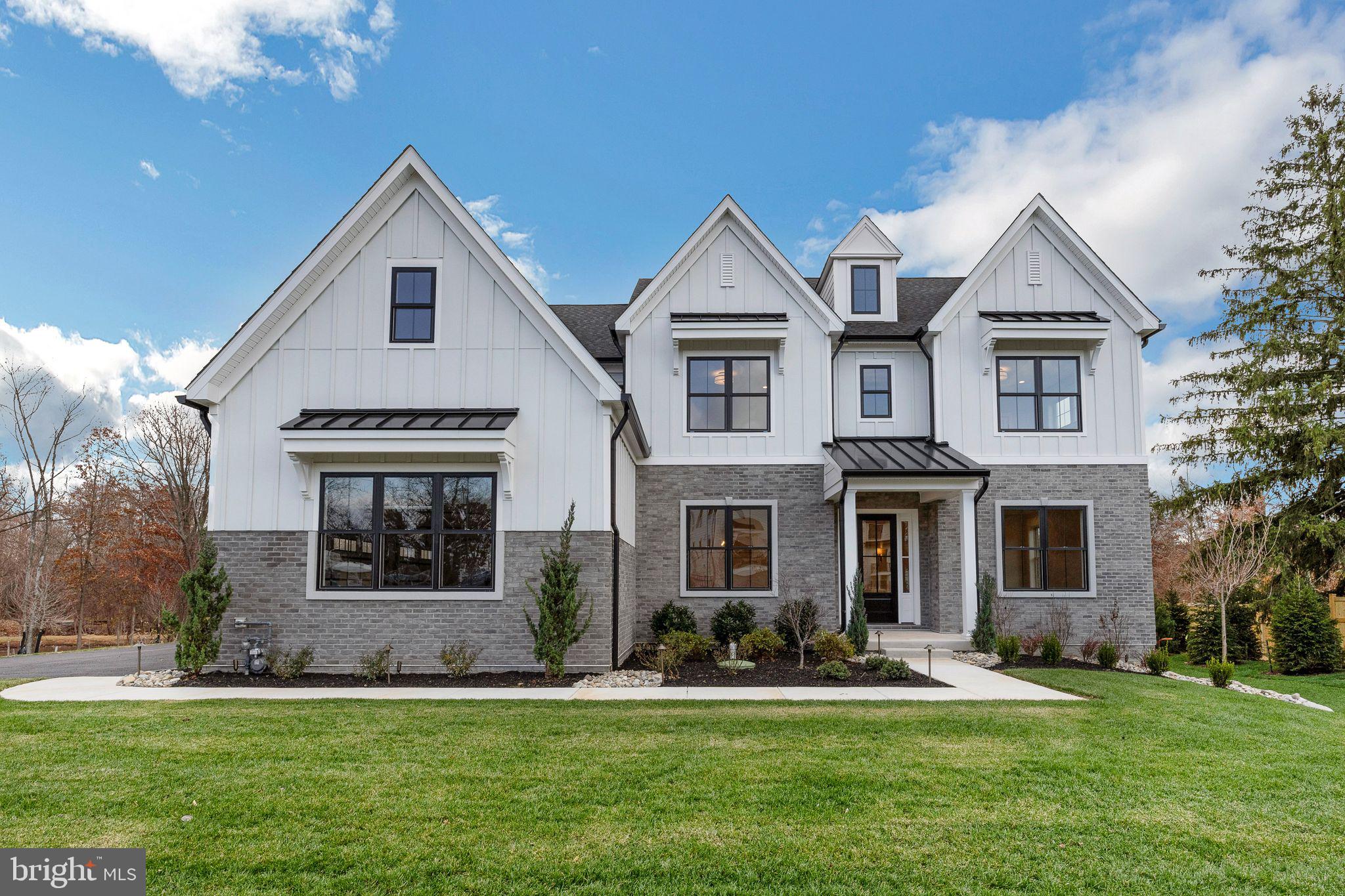 Quick Delivery! Exquisite Model Home Now Available for sale – Sawyer’s Run, Blue Bell.
Welcome to Sawyer’s Run—a boutique community in the heart of Blue Bell where luxury living meets exceptional craftsmanship. Built by renowned local builder Marc Salamone Homes, this move-in ready model home is nestled on just under an acre in a serene enclave setting and showcases the finest in design, finishes, and functionality. Step inside to find an open and thoughtfully designed floor plan, highlighted by 10-foot ceilings, field finished hardwood flooring, and sophisticated millwork throughout the main level. The heart of the home is the chef-inspired kitchen, featuring a large center island, 36” professional-grade slide-in range, additonal oven, microwave drawer, vented hood, under-cabinet lighting and outlets, and beautifully lit glass display cabinets. A walk-in pantry offers abundant storage, while the beverage center with sink adds a perfect touch for entertaining. The kitchen flows seamlessly into the impressive great room, where a beamed ceiling and gas fireplace create a warm and inviting atmosphere. Formal living and dining rooms provide elegant spaces for gatherings, and a private study is ideal for a home office or play room . A spacious mudroom with built-in bench connects to the attached 3-car garage, offering functionality and everyday convenience. Upstairs, the luxurious owner’s suite is a true retreat, featuring a dramatic tray ceiling, a cozy sitting area, and three walk-in closets. The spa-like bath is complete with a soaking tub, oversized walk-in shower with bench, dual vanities, and linen storage. Three additional bedrooms—each with its own en-suite bath—offer comfort and privacy for family or guests. A second-floor laundry room adds everyday ease.
The finished lower level includes a full bath and 9-foot ceilings, providing flexible space for recreation, a gym, guest quarters, or media room. Located in one of Montgomery County’s most desirable communities, this spectacular home combines elegance, convenience, and thoughtful design in every detail. GPS: 726 Penllyn Blue Bell Pike, Blue Bell, Pa 19422