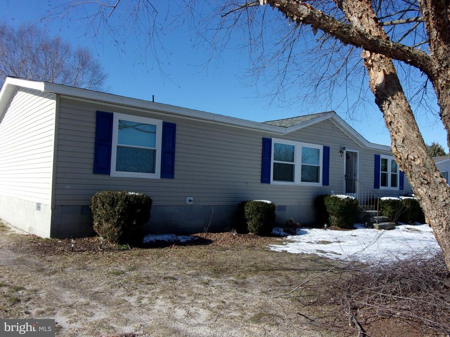 [This property is back on market as previous buyer's financing did not receive final approval.]
 Looking for a comfortable and affordable home in a quiet neighborhood?  Look no further than this spacious Class C rambler with 3 bedrooms, 2 bathrooms in the Sandy Ridge community of Laurel, Delaware.  This home has been lovingly maintained by the original owners.  A roof replacement (2023), new HVAC system (2023) and new windows throughout (2022) are just a few of the improvements made to this home.  A lovely 12' x 24' family room with cathedral ceiling has been added to the rear of this home, making it a perfect space for relaxing and entertaining.  There are French doors leading from this room to the outside back deck for further entertaining space.  Kitchen is well-equipped with appliances and a breakfast bar.   The master bedroom has a walk-in closet and an ensuite bathroom with both a tub and shower stall.  The additional two bedrooms at the other end of the home are spacious and share a hall bathroom.  There is a separate laundry room with the side-by-side washer/dryer.  There is a large back yard with a shed for outside storage.   This home is conveniently located close to schools, shopping and dining along the Rt 13 corridor.