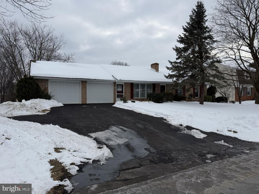 Location, Location, Location, is where to start and then you have a well built brick ranch home with 3 Bedrooms and 2 Bathrooms. As a bonus you have 5 garages,  a oversized 2 car attached garage, and 3 garages under the house that you access from a driveway behind the house. This home could use some updating and flooring but has so much to offer.