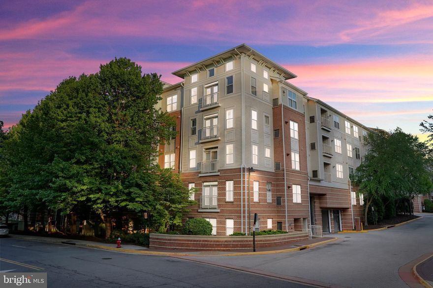 OPEN FRI 4/24 4-6 PM & SUN 4/26 3-5 PM! Rare opportunity! Don’t miss your chance to own this beautiful updated 2-bedroom, 2-bath top-floor corner unit, complete with garage parking and across from the Vienna Metro. Located within the highly sought-after Madison High School pyramid, this home offers the perfect blend of comfort, style, and convenience.

Step inside to a bright and dramatic open floor plan featuring new luxury vinyl flooring throughout, soaring two-story ceilings, and an abundance of natural light from abundant windows. The sun-drenched living room showcases a striking wall of windows, a cozy gas fireplace with mantel, ceiling fan, and access to a charming Juliet balcony—perfect for enjoying fresh air. The spacious layout also provides ample room for a dining area, making it ideal for entertaining.

The open-concept kitchen is both stylish and functional, featuring white cabinetry, stainless steel appliances, a modern backsplash, and a center island with bar seating.

The second bedroom is equally spacious and offers excellent closet space, while the updated hallway bathroom adds convenience. An in-unit laundry closet includes a full-size washer and dryer. A dedicated office nook and welcoming foyer complete the space.

Other recent updates include fresh paint and a hot water heater (2018).

Enjoy an array of community amenities, including an outdoor pool, fitness center, basketball court, recreation facilities, golf room, party room, meeting room, business center, and a resident lounge with TV.

Outdoor enthusiasts will love nearby Nottoway Park, offering tennis, volleyball, and basketball courts, gardens, a tot lot, and scenic walking and biking trails.

Ideally located inside the Beltway, you’re just minutes from the Mosaic District, downtown Vienna, and Tysons Corner for premier shopping, dining, and entertainment. Commuters will appreciate easy access to I-66, I-495, Route 50, Route 29, and Maple Avenue (Route 123).