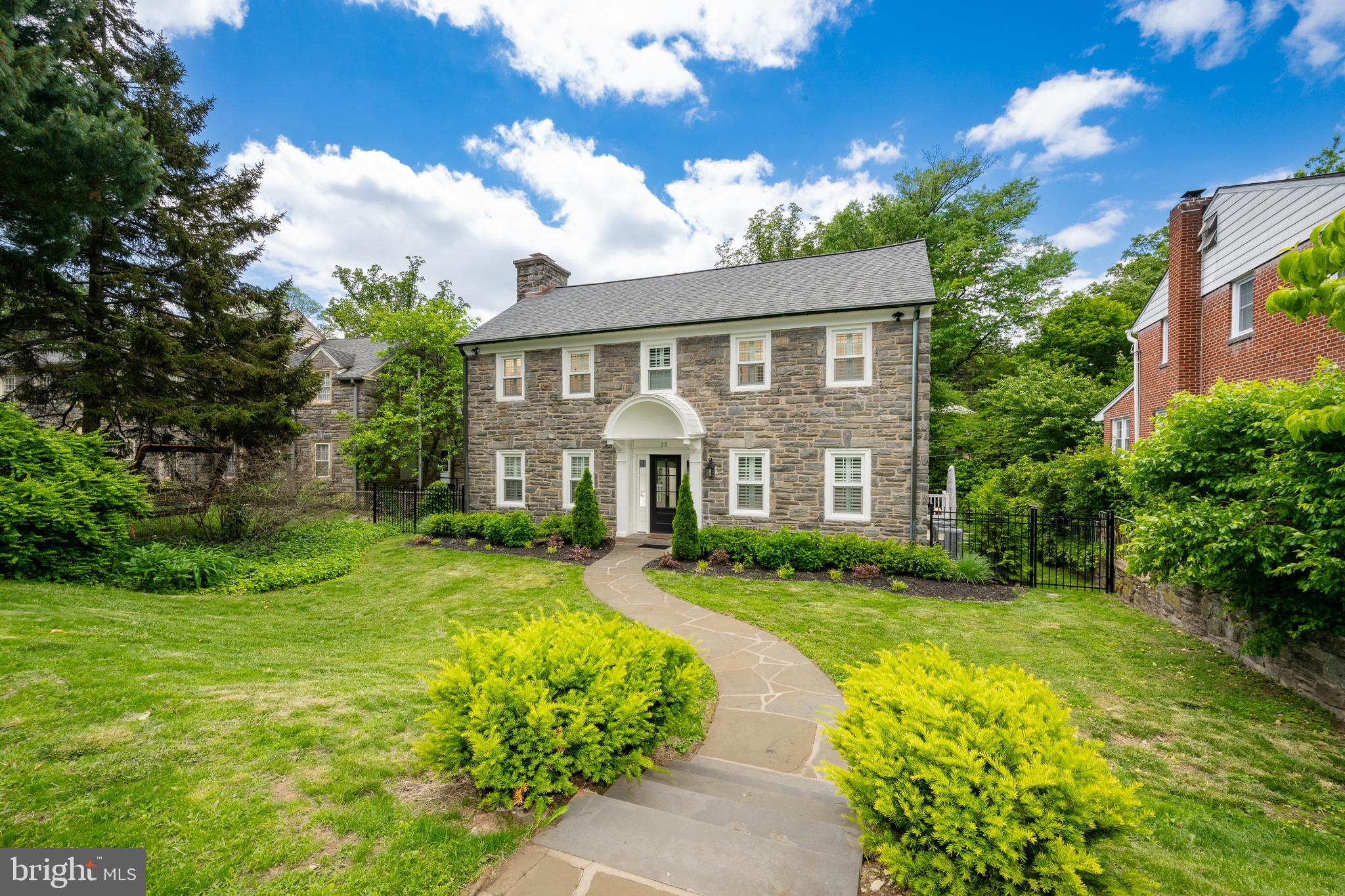 This stone center hall Colonial, built in 1925, features a street-to-street lot with an exceptionally large yard for Penn Wynne. Entirely renovated in 2023, this home has traditional character with modern amenities. The center hall greets you and the living room with wood-burning fireplace is to your left. The dining room is to the right. At the back of the living room, there are french doors to a rear balcony overlooking the yard. Behind the dining room you'll find the expansive kitchen, featuring an island with table height seating. There is an adjacent breakfast room and powder room. Off the kitchen is another access door to the balcony. The second floor offers a primary bedroom with an en suite bath. The en suite features a double vanity and a large walk-in marble shower. In the hallway, there is a second laundry hook-up in the closet. This floor features three more bedrooms. The largest of those three bedrooms is connected to the hall bath via pocket door, but the bathroom also has a door to the hallway for guest access. The second bedroom is to the left of the hall bath, and the third bedroom is at the end of the hall with an en suite bathroom with bathtub. The lower level is an incredible family room and office. The family room has barn doors to offer a private respite away from the rest of the house. A full bathroom and exterior entry on this floor with a mudroom makes it a great space if you need an in-law suite or guest space. The attached garage leads into a finished space with utilities tucked away and and where the owners have chosen to put their laundry. The mudroom has lots of built-in storage to catch those backpacks and jackets on the way in. New windows, dual-zone hvac, electric, plumbing...just move in and start enjoying all that Penn Wynne has to offer. Just up the street from the Wynnewood library, located in the choice high school area of Lower Merion Schools.