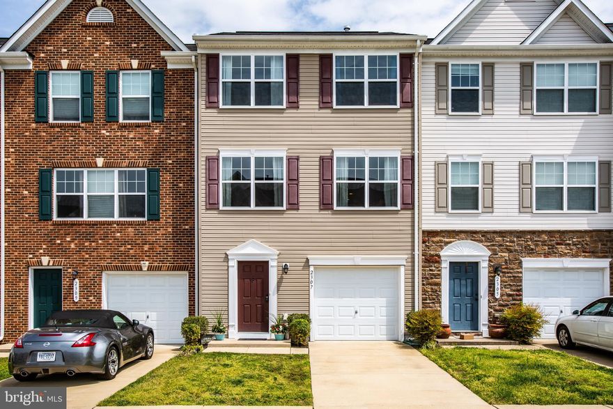 CUTE and SPACIOUS  move-in ready 3 LEVEL home!   Over 1800 sqft townhome with GARAGE!   Beautiful Kitchen with center ISLAND, eat-in table space, and tile flooring!   Kitchen opens to large Living area on main floor level with half bath (bathroom on every level!).   Living room has new, beautiful maintenance-free & upgraded wood plank laminate flooring!  Upper LAUNDRY area on bedroom level for convenient living!   Large Master Bedroom suite with WALK-IN closet!  Master bath offers tile flooring and tub/shower combo!    4th Bedroom in lower level can be used as bedroom, home office, family room, or gym!    Sun deck located off kitchen for grilling, reading, or just relaxing!  Brick patio in rear yard perfect for gathering and enjoying the outdoors!   Garage AND driveway parking!    This home is located in USDA eligible area!   LOW or NO down payment options!   Why rent?  CALL TODAY....     FOR SHOWINGS:   PLEASE REMOVE SHOES & USE HAND SANITIZER PROVIDED.    (PARKING:   Pls park on in the concrete driveway directly in front of home ONLY... or visitor spots are on corners of each lot.  Visitor spots are not numbered or marked. )