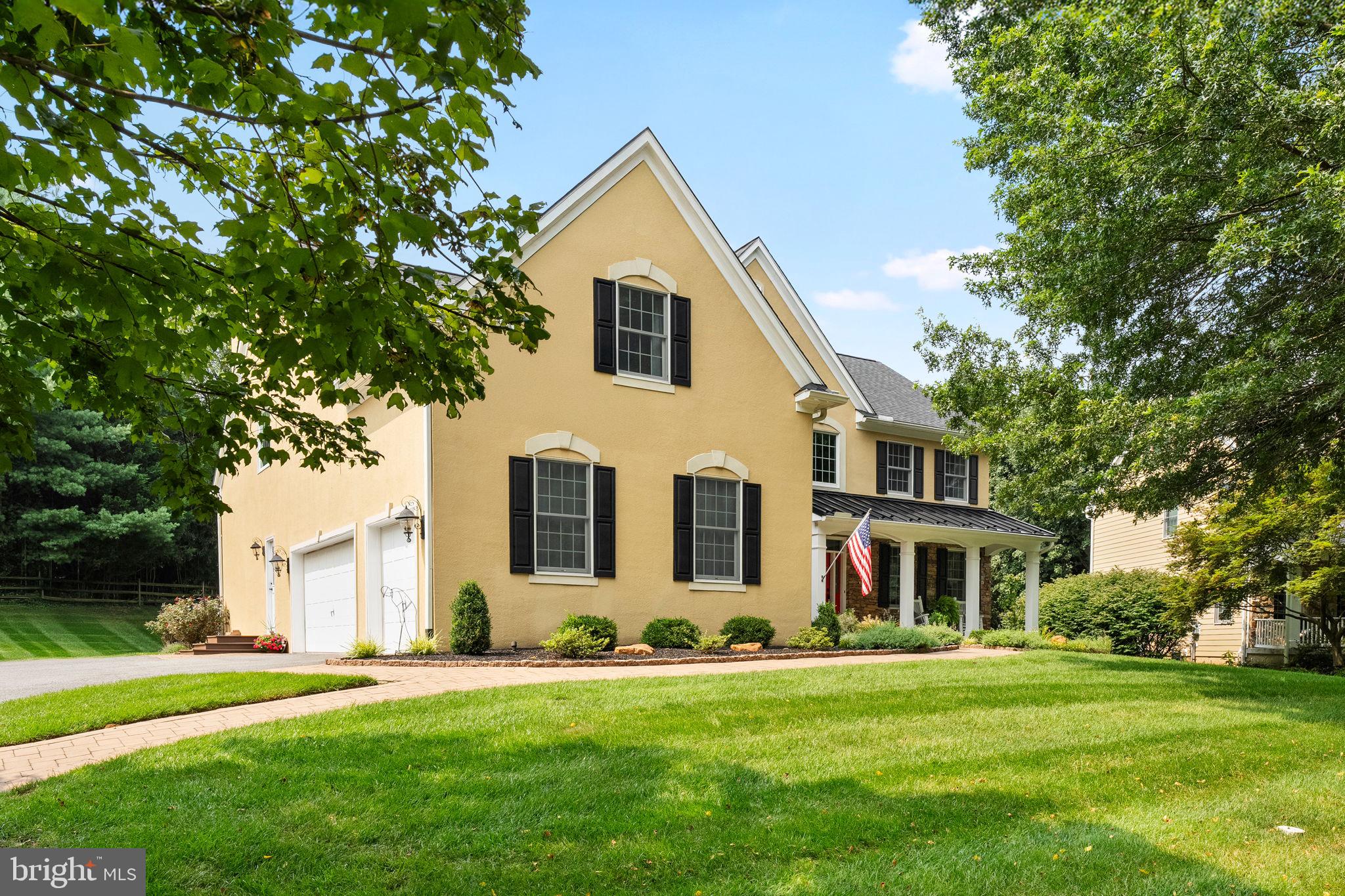 Experience luxury living at its finest in this stunning, colonial style residence nestled in the sought-after neighborhood of Saint Andrews Village at Hartefeld. A one-year social golf membership at Hartefeld National is included - offering exclusive access to one of Chester County’s most scenic private clubs.
From the moment you enter, you’ll notice the exquisite attention to detail with gleaming hardwood floors, soaring ceilings, and dual staircases that set the tone for the luxury within. The grand foyer opens to both the formal living and dining rooms, while the light-filled family room features a dramatic two-story gas fireplace framed in natural stone and expansive views of the lush, private backyard.
The heart of the home is the chef’s kitchen which is complete with a Wolf gas range, Bosch dishwasher, stainless steel appliances, walk-in pantry, granite countertops, and an oversized island perfect for casual seating and gathering. An adjacent breakfast area and direct access to the deck create a seamless flow for entertaining indoors or out.
With 4,581 square feet of thoughtfully designed living space, this home offers four spacious bedrooms, three-and-a-half bathrooms, and a first floor home office - perfect for working from home or creating your dream hobby space. The primary bedroom suite is a sanctuary unto itself, featuring two large walk-in closets, a sitting room or second office, and a spa-like bathroom with a soaking tub, walk-in shower, and dual vanities. A second bedroom is complete with it's own en suite bathroom, while a third bedroom connects to a full bathroom, and the fourth bedroom is expansive and oversized.
Additional highlights include: first-floor laundry, custom crown molding and detailed woodwork, a Bose surround sound system, three-car garage, gorgeous outdoor deck and covered front porch with charming curb appeal, and abundant storage and thoughtful built-ins throughout.
Located in a tranquil, country-like setting directly across from the 10th fairway and within walking distance to the prestigious Hartefeld National golf club, the community pool, clubhouse and fitness center as well as tennis courts. This home is pristine, move-in ready, and offers a lifestyle of elegance, comfort, and recreation. Saint Andrews Village is one of the most private sections of Hartefeld, located on a quiet cul-de-sac, and with convenient access to Kennett Square, Hockessin, Longwood Gardens and all of the wonderful dining and shopping this exclusive area has to offer.