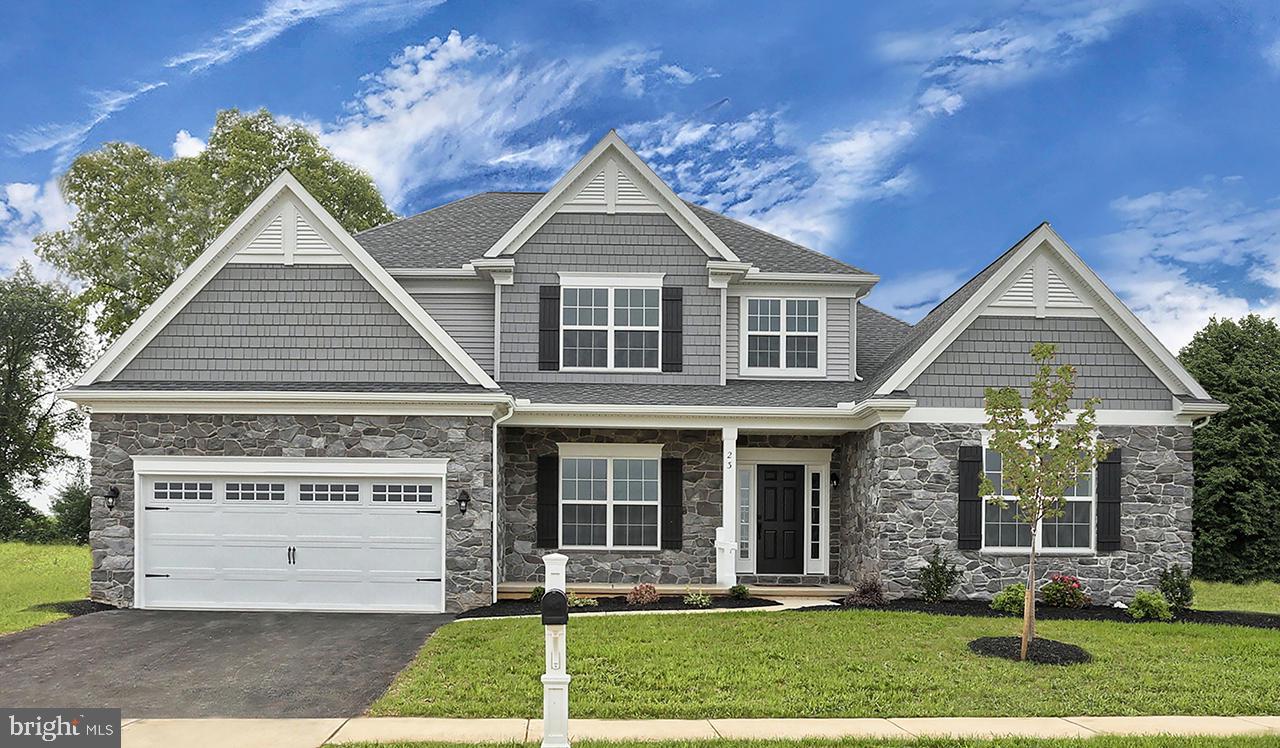 This stately 2-story home with welcoming front porch includes a 2-car garage with entry complete with built-in lockers. The spacious floor plan includes a Study, and a Dining Room to the front of the home. Hardwood flooring in the Foyer extends to the Dining Room with spacious Great Room featuring a cozy gas fireplace with stone surround. The Great Room is adjacent to the Kitchen featuring granite countertops with tile backsplash and the Breakfast Area. The sunny Breakfast Area provides access to the patio and backyard. The first-floor Owner's Suite is a cozy retreat featuring a private bathroom with tile shower, free standing tub, and double bowl vanity, and an expansive closet. The 2nd floor boasts 3 additional bedrooms, a full bathroom, and a spacious Rec Room.