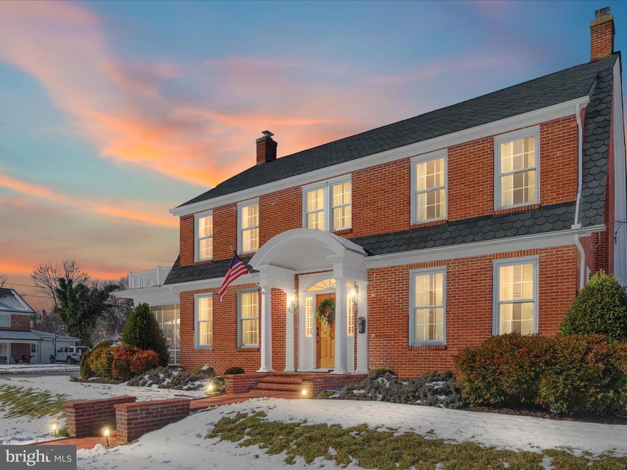 Step into this timeless treasure, offering over 2700 sq. ft. of living space that beautifully blends classic charm with modern convenience.  This two-story brick home, circa 1930's, exudes character and has been meticulously updated to meet today's standards. 
 
Inside, you'll find gleaming hardwood floors throughout and custom interior wooden shutters that enhance its classic appeal.  The natural gas fireplace in the living room creates a cozy focal point, while the galley kitchen boasts granite countertops, making it both functional and stylish. 

The home's thoughtful layout includes a first-floor bedroom and full bath, perfect for guests or main level living, with four additional bedrooms and a second bath on the upper level.  The walk-up attic presents a fantastic opportunity for additional living space, and the full unfinished basement provides abundant storage  or creative potential.

Outdoor living is a dream with a charming screened porch, perfect for relaxing or entertaining.  The detached two-car garage adds to convenience and complements the home's timeless exterior.
Situated in a prime downtown location, this well-cared-for move-in-ready home offers proximity to everything you need, from shopping and dining, to schools and parks. With numerous updates and impeccable care, this is truly a classic home waiting for its next chapter.

Don't miss the chance to own this remarkable blend of history, charm, and modern living!