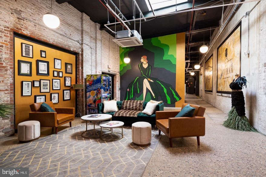 Introducing The Gotham, a new and innovative residential complex located just west of Fishtown. This thoughtfully designed mixed-use development seamlessly blends modern living with Philadelphia’s rich industrial history. Originally home to the Gotham Silk Factory (1917–1935), the building’s meticulous renovation honors its historic roots while providing upscale conveniences for the contemporary urban dweller.

The Gotham boasts expansive living spaces with soaring ceilings that create an airy, open ambiance. Natural light pours through large windows, highlighting premium finishes that add a touch of luxury to each unit. Residents will appreciate stylish, modern kitchens ideal for culinary enthusiasts, as well as the convenience of in-unit and onsite laundry facilities. With energy-efficient appliances and advanced climate control systems, these homes offer both comfort and sustainability.

The amenities at The Gotham are equally impressive. A state-of-the-art fitness center caters to active lifestyles, while eco-friendly building systems reflect a commitment to sustainability. Residents can enjoy lush rooftop decks with stunning city views, a communal lounge with a fully equipped kitchen for social gatherings, and a dedicated dog park for their furry companions. Secure Latch door hardware technology and private parking add an extra layer of convenience and peace of mind.

With over 100 residential units and more than 6,000 square feet of commercial space, The Gotham offers an unparalleled opportunity to live in a vibrant, connected community. Schedule a tour today to experience this one-of-a-kind property.