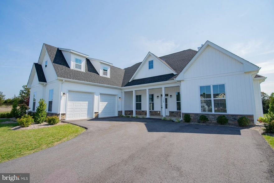 Immediate delivery, Builder offering up to $18k in close assistance!   Welcome to this remarkable 5 bedroom, 3.5 bath ranch style home featuring an open floor plan with 10ft ceilings throughout the main level.  The kitchen offers quartz countertops, a large island, and a breakfast area with bay windows and features a gas fireplace.  From the kitchen, you can enjoy views of the massive covered patio, seamlessly connecting the indoor and outdoor spaces. The greatness of this home extends to the spacious great room with an impressive vaulted ceiling, where natural light floods the space, creating an inviting atmosphere for relaxation and entertainment. The great room shares the same beautiful views of the covered patio.  The large primary bedroom suite is a true retreat within this home. It offers a sanctuary of comfort and luxury, with a remarkable primary bath and two sizeable walk-in closets. The primary bath features high-end finishes, including a dual-sink vanity, a large soaking tub, and a spacious shower. With this level of sophistication and attention to detail, the primary bedroom suite is designed to provide the ultimate relaxation and privacy. The secondary bedrooms in this home are equally impressive, offering ample space and comfort for family members or guests. Each bedroom provides a cozy and private retreat. Additional features of this home include two additional bedrooms located on the second story, providing even more space and flexibility.  Schedule a tour of this home to see what The Estates at Edgemoor has to offer.