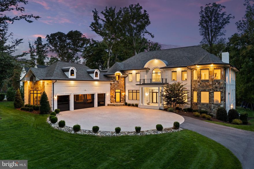 New Price! Open Houses Saturday & Sunday 2:00 to 4:00pm! Welcome to the pinnacle of elegance in McLean. Gracefully nestled on a 1.26 acre premium property, this residence is a masterstroke in luxurious living. Covering 12,600 sq.ft., it flaunts masterful finishes, from the expansive four-car garage to its polished interiors.

As you approach, a majestic gate welcomes you, enhanced with state-of-the-art security systems, automated access, and an intercom, epitomizing modern security and convenience. Circular Motor-court paved with premium granite stone pavers guides you a grand entrance. 

Step inside through a pristine glass door, revealing the home's heart. Beneath your feet, the gleam of 7.25-inch white oak hardwood narrates tales of exquisite taste. The entry is dominated by a mesmerizing Nella Vetrina chandelier, playing sentinel to the alluring spiral staircase. The shared spaces, living and dining, are canvases painted in light, accentuated by SCHONBEK and Bethel chandeliers. The kitchen is nothing short of a culinary artist's dream, boasting custom Decton countertops and an extensive 60-inch gas range, framed by elite European cabinetry. Just a step away lies a secondary kitchen, perfect for grand soirees. The mudroom nearby doubles as a haven for pets, complete with a dedicated dog spa.

The upper level unveils four opulent bedrooms, each a sanctuary with its walk-in closet and lavish bathroom. Even functional aspects, like the Toto fixtures in the primary and powder rooms, exude luxury. A commodious loft promises moments of relaxation. The primary bedroom is an ode to tranquility, replete with a spa-inspired en-suite and a balcony overlooking nature's splendor.

Descend to the lower level, a confluence of leisure and entertainment. Here, two bedrooms are linked by a Jack and Jill bath. Stay active in the personalized gym, crowned by a rejuvenating sauna. The floor also houses a theater, a sprawling recreation zone, a plush bar, and a wine chamber.

Outdoors, experience an entertainer's dream: a high-end kitchen, a shimmering pool with a cutting-edge saltwater system, and a hot tub that dances to the tune of a water fountain.

The residence embraces modernity with the Control 4 system, Lutron blinds, and a lavish elevator, ensuring a harmonious flow across its vast dimensions.

Strategically located in McLean's heart, this home merges urban convenience with nature's serenity. With rapid access to Tyson's Corner, Dulles Airport, and DC, its locale is unmatched. Surrounding parks and trails beckon nature lovers. Here, luxury isn't just seen; it's experienced. Seize this unparalleled opportunity.