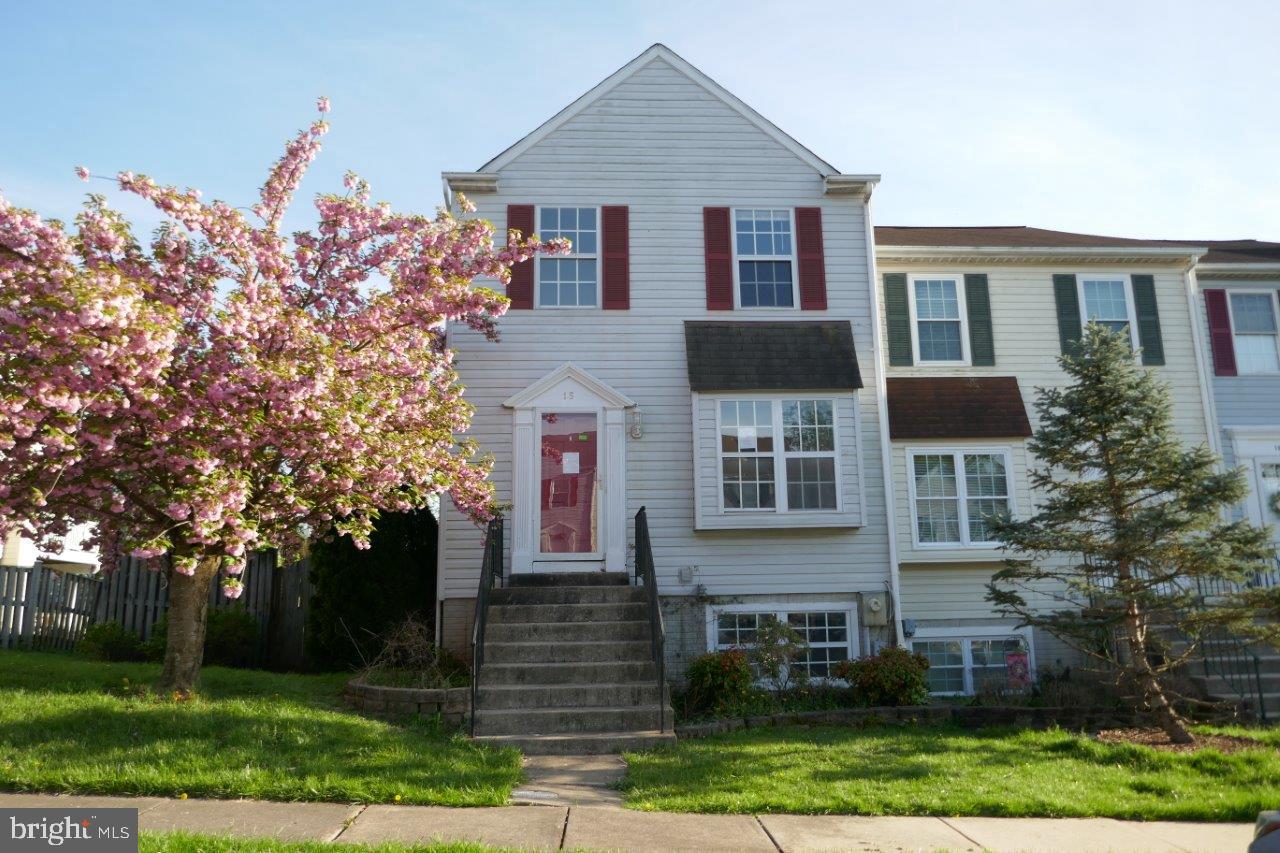 Welcome home to this charming and cozy end unit townhome. Come see your next home in these peaceful and lovely neighborhood. As you enter, be greeted by the large, spacious living room. Continue to the combination kitchen and dining room with lots of cabinet space and the sliding glass door with access to the deck overlooking your expansive yard. As you ascend to the 2nd level, you will find the 3 decent-sized bedrooms and 1 full bathroom. Descend to the basement to find your family room with fireplace and an additional full bathroom and a laundry room! With sliding glass door that leads to the patio and backyard. Schedule your showing today to come and see for yourself everything this home has to offer.
