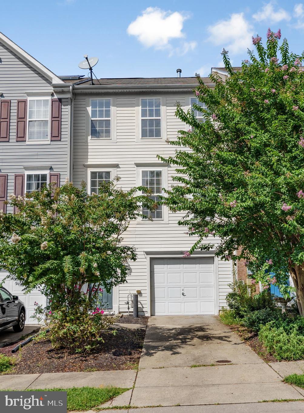 Nestled in a highly sought-after neighborhood, this beautifully maintained townhouse offers 3 spacious bedrooms, 2 full bathrooms, and a convenient half bath, eat-In kitchen with island and stainless steel appliances. Designed for both comfort and functionality, it features a bright recreation room, in-unit laundry, and a one-car garage with remote access. The primary suite boasts a generous walk-in closet, while the community enhances your lifestyle with access to a sparkling pool and a well-equipped community center. Perfectly blending style and convenience, centrally located near shopping, restaurants, parks, and entertainment, this home is ideal for modern living. Owner Occupied DO NOT Access without Approval.