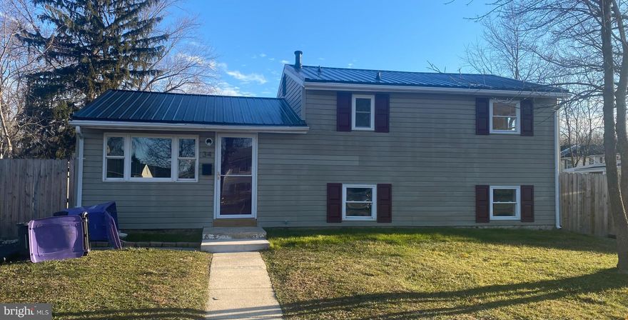 Wait until you see this beautifully updated 3-bedroom, 1-bath property at 34 Chestnut Drive. This home has everything fresh throughout and features a brand-new kitchen with granite countertops, SS appliances, soft close cabinets, and updated flooring throughout. New windows and ceiling fans in every room add comfort and efficiency. The lower level offers a bonus room that could serve as a 4th bedroom, office, or flex space. Enjoy a large, fully fenced level backyard complete with a generous sized shed. Also there's a new, low maintenance metal roof! You have off-street parking, and the convenience of town trash and recycling services. Ideally located close to I-95, shopping, restaurants, and everyday conveniences—this move-in-ready home has it all. Better Hurry!

Mortgage savings may be available for buyers of this listing.