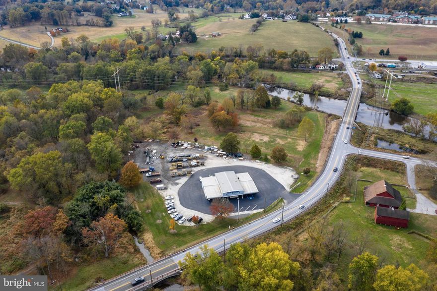 "Think of the Possibilities!" 10+ acres bordering the Brandywine. Attention all Business Owners, Investors and Developers! Prime location with high visibility in Birmingham Township. Frontage on Street Rd/926 located across from Brandywine Ace Hardware and adjacent to Pocopson Veterinary Station. Plenty of on-site parking. Existing Building was extensively renovated in 2014 and offers over 7600 square feet with main entrance reception area (ADA Compliant) bath, expansive warehouse space with multiple garage doors and access points. Second level features 5 large office rooms, conference room and Kitchen with Bath. This property has so much to offer with unlimited potential and is conveniently located in a very high traffic area. Currently tenant occupied. Conditional Use in place for current business.