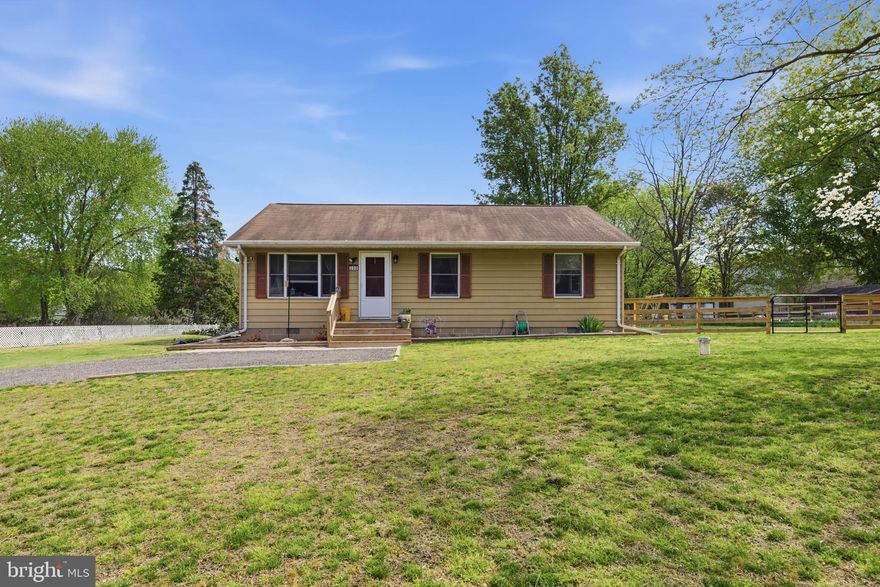 Welcome to 208 Central Drive, nestled in the desirable Chester Harbor community just minutes from historic Chestertown. This charming 3-bedroom home offers the perfect blend of comfort, convenience, and value, all situated on a generous 0.55-acre lot with beautifully landscaped grounds and mature trees. Step inside to discover a fresh, move-in-ready interior featuring brand-new wood flooring (2025) through the living room, first bedroom, and hallway. The home is enhanced by updated lighting and ceiling fans throughout (2024–2025). The bathroom has been renovated with a new tub/shower combination (2024), a stylish vanity, updated lighting and mirror (2024). The expansive yard has been newly landscaped in 2024 and fresh grass seed and treatment in 2025. A new fence (2025) adds privacy and makes the outdoor space perfect for relaxing and entertaining. Additional details and a complete list of upgrades can be found in the document section,  along with the floor plan and room measurements.