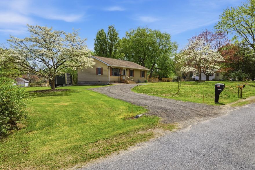 Welcome to 208 Central Drive, located in the desirable Chester Harbor community just minutes from historic Chestertown. This charming 3-bedroom, 1-bath home offers a wonderful blend of comfort, convenience, and value. It sits on 3 lots totaling approximately 0.55 acres, surrounded by mature trees and landscaping. Step inside to a bright, move-in-ready interior featuring brand-new wood flooring (2025) in the living room, hallway, and first bedroom. The home was thoughtfully updated with new lighting and ceiling fans throughout (2024–2025). The bathroom has been fully updated with a new tub/shower combination (2024), a stylish vanity, updated lighting and mirror (2024), a newer toilet (2023), and new flooring (2024). The kitchen includes a reverse osmosis water filtration system (2023), a new water filter (February 2026), and a stove/oven that is approximately five years old. Major systems have also been addressed, including a new water heater (2025), septic system inspection and pumping (2025), and three new electric heating units (2023). Outside, the expansive yard is a standout feature. Recently landscaped in 2024 and enhanced with fresh grass seed and treatment in 2025, the property offers plenty of space to enjoy. Outside includes a crab apple tree, a fig tree, a white pear tree, 2 white dogwood trees, and forsythia. Brand new rear screen door (2026) and a newly installed rear fence (2025) enhance both privacy and functionality, creating an ideal setting for relaxing or entertaining. Set on a generous lot with thoughtful updates throughout, this property offers exceptional value in a prime location just minutes from historic Chestertown, shops, dining, and waterfront. Enjoy water access to Rosin Creek in the community, which adds to the home’s appeal for outdoor enthusiasts.