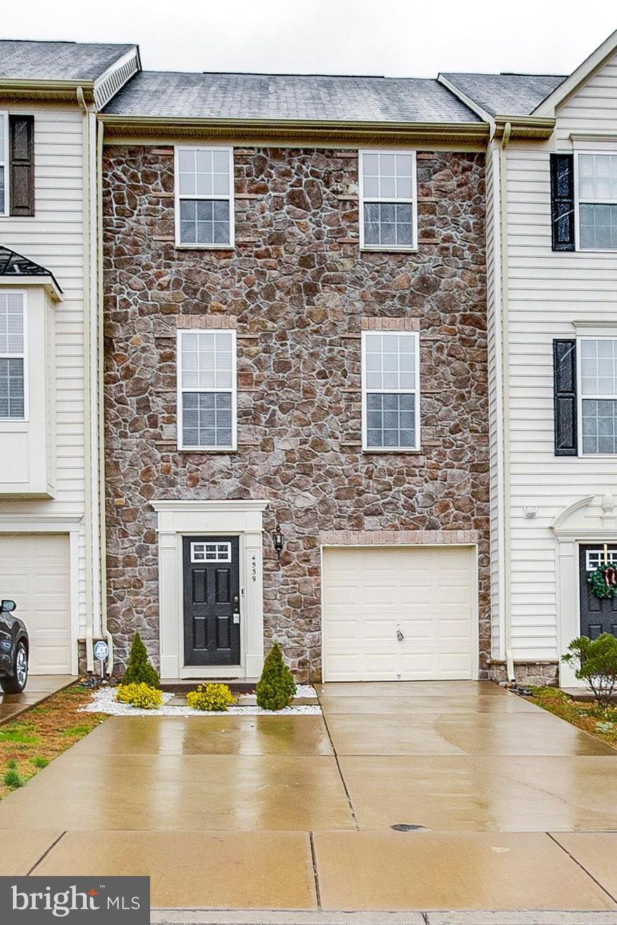 Spacious 3 story townhouse ready for immediate occupancy. Lower level includes a large rec room for entertaining with half bath and walk out access to the spacious back yard. The main level features open concept living with a large eat-in kitchen w/ an island and peninsula to seat all your guests.  The family room is just off the kitchen and easily can accommodate a large sectional for game nights or holiday gatherings.  Upstairs you will find the master suite w/ large walk in closet and en suite w/ a walk in shower & double vanity. There are also 2 additional bedrooms and another full bath. Home includes a 1 car garage, 2 driveway parking spots, plus additional guest parking in the community.