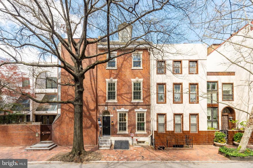 A rare and remarkable offering in the heart of Society Hill, this custom-built residence blends historic charm with refined modern design across more than 3,500 square feet of sun-filled living space. Thoughtfully configured with 5 bedrooms, 6 luxurious bathrooms, and four private outdoor areas, the home offers exceptional scale, privacy, and flexibility for elevated city living.The main level is anchored by a striking chef’s kitchen featuring Miele appliances, including an oversized refrigerator and 6-burner range, paired with gorgeous countertops and a massive island ideal for both casual meals and entertaining. A formal dining room is perfectly positioned between a serene interior courtyard and a private red brick patio with an outdoor fireplace—creating a seamless indoor-outdoor flow rarely found in city living. The main living room is open and inviting, one of several spacious zones designed for both relaxed comfort and elegant gatherings.

Upstairs, the primary suite serves as a peaceful retreat, complete with a generous walk-in closet and a spa-like bath featuring custom tile work and curated finishes. A second bedroom with an en-suite bath completes this floor. The third level features two additional bedrooms, a large entertainment lounge with a full wet bar, another full bathroom, and access to both a private terrace and an expansive roof deck with sweeping city views.

Crowning the home is a dramatic lofted level, ideal for an additional bedroom, home office, or den, with two walk-in closets offering ample storage. The fully finished lower level includes an au pair or guest suite with a designer bath, plus a flexible living space perfect for a gym, media room, or game area.

Additional highlights include a custom steel-and-wood floating staircase, multiple HVAC zones, custom storage throughout, and prepaid one-car parking just around the corner with an acceptable offer.

Located within the coveted McCall school catchment and  just blocks from Washington Square Park, acclaimed restaurants, and both Jefferson and Pennsylvania Hospitals, this is a rare opportunity to own a meticulously designed residence in one of Philadelphia’s most prestigious and walkable neighborhoods.