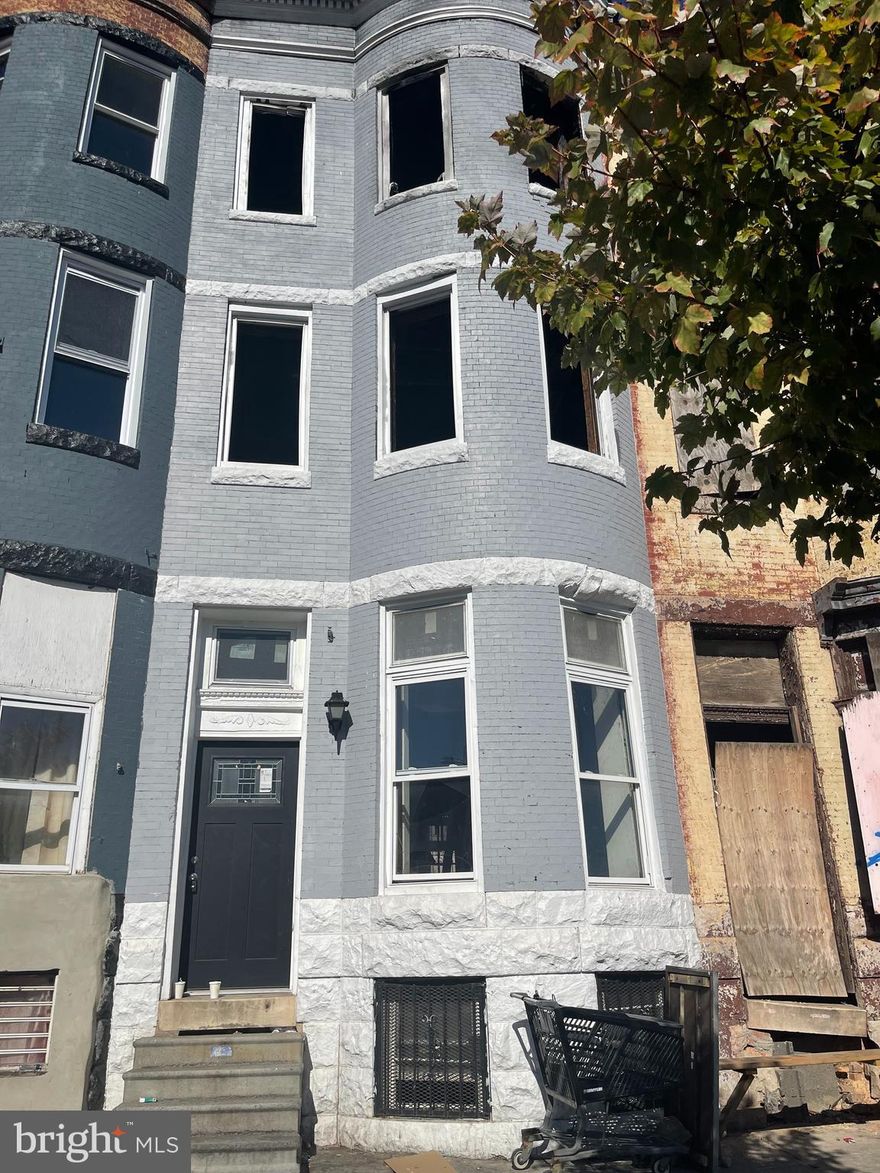 3 -unit building ready for your imagination. This is a shell. Needs complete renovation.