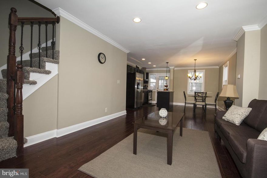 MOVE RIGHT IN!! This house won't last.  Beautiful Granite counters with All New Stainless Steel Appliances in kitchen. Recessed lighting through out with gorgeous light fixtures to compliment the stunning d cor.  All New ceramic tile baths, finish basement with full bath and walkout to fenced rear yard.