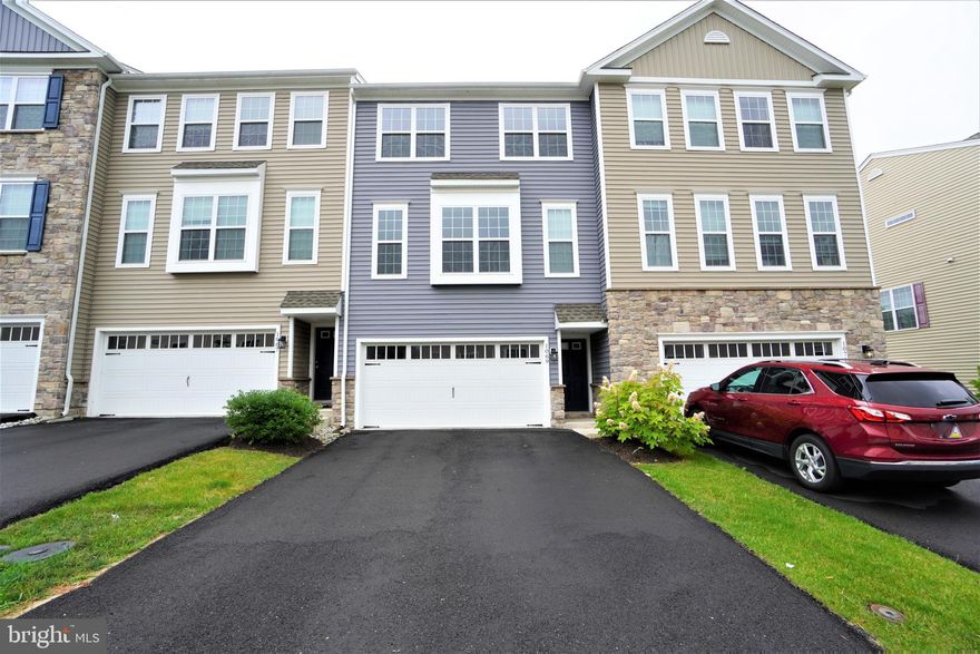 3BR, 2 Full 2 Half Bath BRIGHT and SPACIOUS townhome located in Hatfield Township. The main living space offers upgraded beautiful hardwood flooring that runs throughout the main level and an open floor plan which is the ideal layout for entertaining and everyday living. The Gourmet Kitchen is a dream come true and includes 42” cabinetry, a large island, custom tile backsplash, granite counters, stainless steel appliances, a breakfast area and sliders that lead to a 12 x 8 maintenance free deck, the perfect place to hang out on a beautiful sunny day. Head upstairs after a long day to the nicely-sized Master Bedroom which includes a large walk-in closet and an upgraded Master Bath with a double vanity and ceramic tiled shower and floor. Two additional Bedrooms, a full Bathroom and the conveniently located Laundry Room complete the upper level. And if that wasn’t enough, don’t forget about the finished walk-out flex room on the lower level that can be used as an Office, additional hang out area or Bedroom with a half bath and sliders that lead out to the rear of the home. The home also includes additional storage in the Garage with a bump out area and a custom built in ceiling storage rack, upgraded recessed lighting package on the main and lower levels and 3 zoned HVAC. North Penn School District and in close proximity to 309, 202, the train with easy access to Doylestown or Philly, restaurants, shopping and so much more. Owner Pay HOA