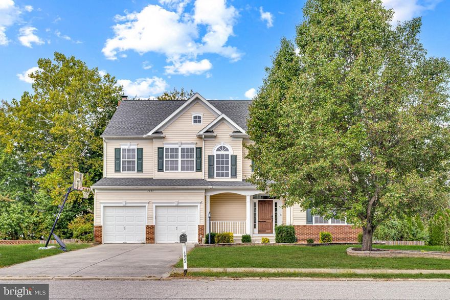 There’s something about this house that makes people smile the moment they walk in. Maybe it’s the light that spills through every window, or the way the open layout feels both grand and comfortable at the same time. Either way, this one just  feels right.

Beautifully designed and freshly painted, this home in the sought-after community of Agricopia was built for living ... really living. Enter through the front door and you’re greeted by gleaming hardwood floors and a two-story foyer with a catwalk that’s seen it all: first-day-of-school smiles, prom-night photos, holiday garlands, and maybe even a few dramatic “I’m-running-late” coffee struts. The kind of space that turns everyday life into memories.

The thoughtful details are everywhere. Elegant moldings, generous room sizes, and that perfect balance between charm and functionality. The private main-level office is ready for your work-from-home days (or those moments when you just need to “take a call” and hide for five minutes). The formal living and dining rooms are gracious yet inviting — perfect for gatherings that stretch long after dessert.

The kitchen is the heartbeat of the home, and this one delivers: granite countertops, stainless steel appliances, a hand-selected tile backsplash, and enough natural light to make your morning coffee feel like a scene from a commercial. It opens beautifully to the family room, where the warmth of the wood-burning fireplace practically insists you slow down for a bit.

Upstairs, you’ll find four spacious bedrooms — including a primary suite that’s less “room” and more “retreat.” Two walk-in closets, dual vanities, a soaking tub, and a separate shower create that quiet space you’ll actually look forward to unwinding in. The laundry room’s upstairs too, because whoever designed that knew exactly what they were doing.

The lower level is unfinished, but here’s where it gets fun — this is your blank canvas. A gym, theater, rec room, workshop, or maybe just the most organized storage space you’ve ever had. It’s all possibility.

And out back? Three levels of decking, artful hardscaping, and plenty of space to create your own backyard vibe — whether that means a dining area under the stars, a cozy firepit corner, or a place for the dog to live his best zoomie life. The paver-lined flowerbeds add the perfect finishing touch and keep things looking crisp year-round.

Agricopia is one of those neighborhoods people wait for — close to downtown boutiques, restaurants, schools, parks, and easy commuter routes to DC, Virginia, and local bases. It’s not just convenient. It’s community.

There are houses, and then there are homes that make you *feel something.* This one? It’s ready for its next chapter. The only question is .... are you?