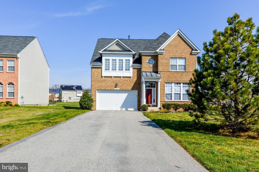 Beautiful 11 year old brick front, 2 car garage home.  The features include a large kitchen with dual ovens, cooktop with 5 burners and granite countertops.  There is a large area in the open floor plan of the rear of the home which has table space which, combined with the french doors makes a great sun/breakfast room. that opens to the deck which steps down to the huge patio.   Walk from there to the family room which has a fireplace and windows down the wall.  Upstairs is a wonderful master suite with a sitting area and large master bath with soaking tub, dual sinks and large glass enclosed shower.  It's always great to have a large laundry room upstairs where the laundry is created.  Also upstairs is a guest room suite which has it s own bath and two other bedrooms separated by a buddy bath.  The basement has a large rec room with a wet bar, 5th bedroom with a large window, great closet space and a connecting door the bathroom.  Basement also has a separate media room and walks out to the backyard.
