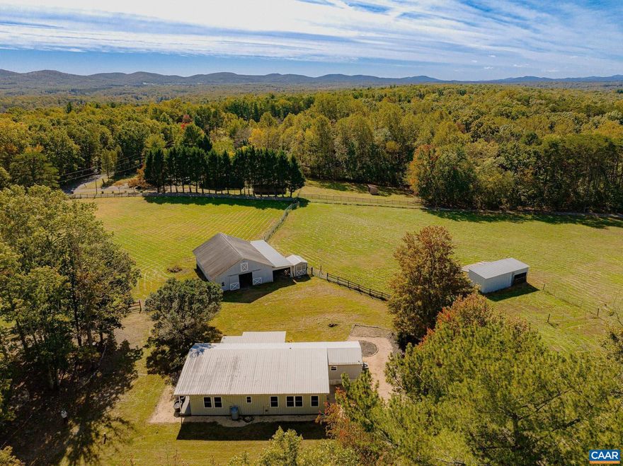 Finally!! A Horse property you can afford in a great location! Located in beautiful Barboursville. Preddy Creek is just a few minutes away. Your new home has just the right mix of woods and pastures, shade trees and gardens, views of the pastures from almost every side. Reclaim the back woods to enjoy a trail to your own stream. The barn has 6 matted stalls, fans and lights, attic, wash bay, tack room with hook up for washing machine. The lean-to runs the length of the barn and was used for hay, tools and equipment. The living room is HUGE. There are 2 primary bedrooms, and the third bedroom has the full guest bathroom directly adjacent. The kitchen is so spacious making it easy for multiple people to work around each other. The property is in need of TLC. Due to health reasons the owner is unable to maintain this beautiful property.