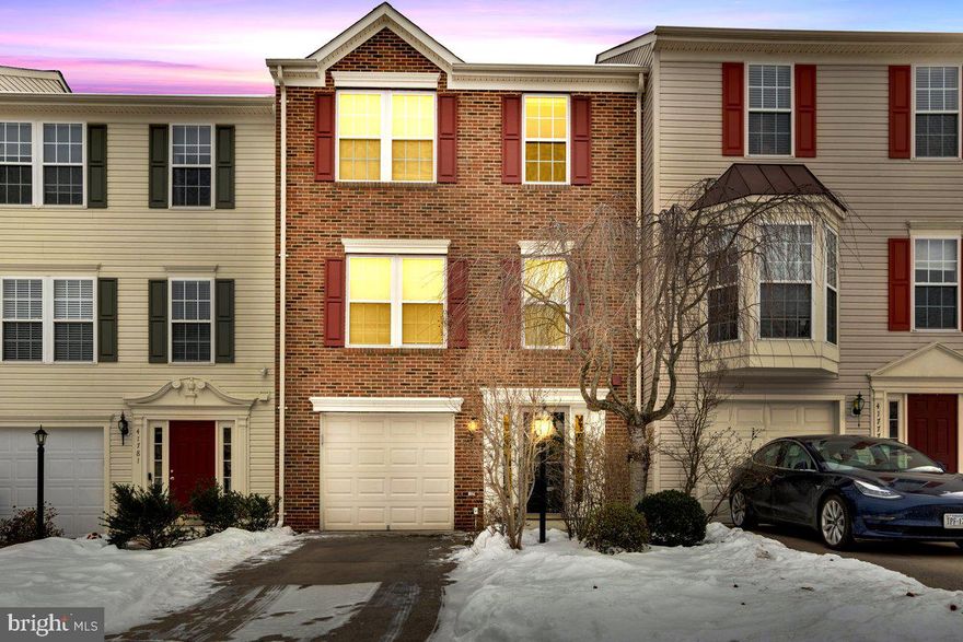 Welcome to this charming 3-level brick front townhome in the sought-after Kirkpatrick Farms neighborhood of Aldie! Upon entering, you’re greeted by a welcoming entrance level featuring a full wet bar, ideal for entertaining guests, along with a convenient half bath. This level also grants access to your own private, fully fenced backyard. The bright and airy primary bedroom is a true standout, showcasing cathedral ceilings and a large walk-in closet. The room is further enhanced by three-piece crown molding, adding a touch of elegance to the space. This home combines comfort, style, and warmth with its thoughtful design and premium finishes. Situated in an excellent location, this home is linked to Lightridge High School, making it perfect for families seeking access to top-tier education. Don’t miss out on the opportunity to live in one of Loudoun county's most desirable communities—schedule your home showing today!