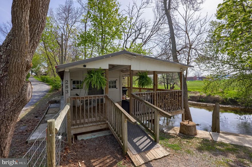 Peaceful Creekside Retreat in Brownstown – Ideal for Camping or Vacation Rental

Welcome to your getaway by the Cocalico Creek! This unique 0.75-acre parcel offers a tranquil setting perfect for weekend camping, kayaking, fishing, or simply enjoying nature. Currently used as a vacation rental, the property features an open camping shelter equipped with a kitchenette, futons for sleeping, an A/C unit, and a space heater—making it a cozy retreat in any season.

All furnishings are included, so it's ready to use or rent out immediately. While there is no well or septic, the property provides a rustic, back-to-nature experience just minutes from Rt 222 and only 15 minutes from Lancaster.

Please note: Do not enter the property without a scheduled appointment. Drive-bys are welcome.