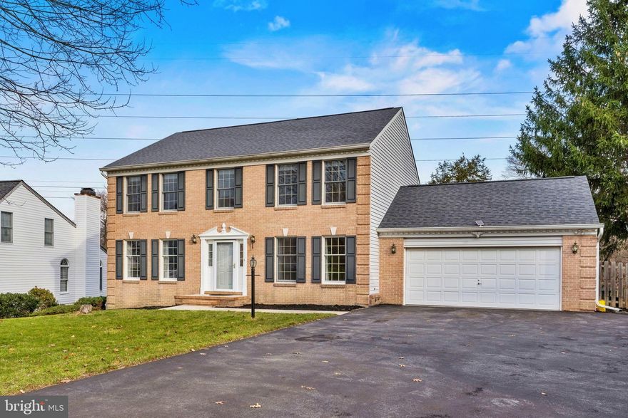 This elegant brick front colonial in Mount Hebron combines style and comfort. It features hardwood floors, a living room & dining room with natural light, and a family room with a wood burning fireplace. The chef's kitchen includes a breakfast area with bay window looking out into the backyard, quartz counters, and stainless steel appliances, leading to a private deck backed to wooded area & direct access to the Patapsco Hiking Trail & Patapsco River. The upper level includes a large primary bedroom with multiple closets, and an ensuite bathroom. There are 3 additional bedrooms with a hall bath.  Walk-out lower level is ready for your design & imagination. Upgrades galore include: Kitchen (2023), roof (approx. 2017), fence (2018), HVAC - (approx. 2010), new mulch & landscaping (2023). Other Improvements - bathroom vanity, updated lighting, newer carpet, paint throughout, driveway resurfacing and more. Easy access to Rt. 29, I-70, Ellicott City and more!