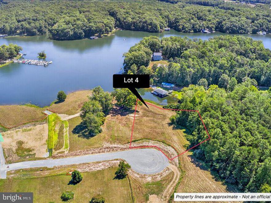Welcome to Lake Anna’s newest Subdivision “Eagle Point”. Located centrally on the Public Side of the Lake with only 5 Waterfront Lots.  All lots have a gentle slope to the waterfront with great views along approved soil reports for a 4-bedroom convention drain field. A state-maintained road installed and will be paved when 3 homes are built. Old power poles and wires to be removed by seller.   95 trees 20 feet wide will be planted along the bike path from the new entrance to the shoreline for privacy.
  Lot 4 is located on 1.00 acre with 180 feet +/_ of shoreline.   Soil Report and Subdivision plat are in the documents.