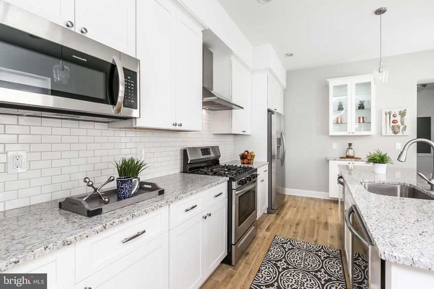 TOTAL GUT CHAP TAX CREDIT RENOVATION IN PROCESS.  Brand New CHAP Tax Credit Renovation by TLC Builders. PHOTOS ARE BUILDER SAMPLES. 123 S East Ave is under construction for delivery in SPRING 2019. Schedule online to view property and to schedule Builder Tour. You re going to LOVE your new TLC Built home TLC homes are not only built up to code with beautiful new finishes, but they also retain the architectural integrity of an original Baltimore row home.  Exposed Brick, HUGE main level includes gourmet kitchen with 8 ft island, full size laundry and half bath.  Master Suite includes plenty of closet space and large master bath. 2 Year Builder Warranty