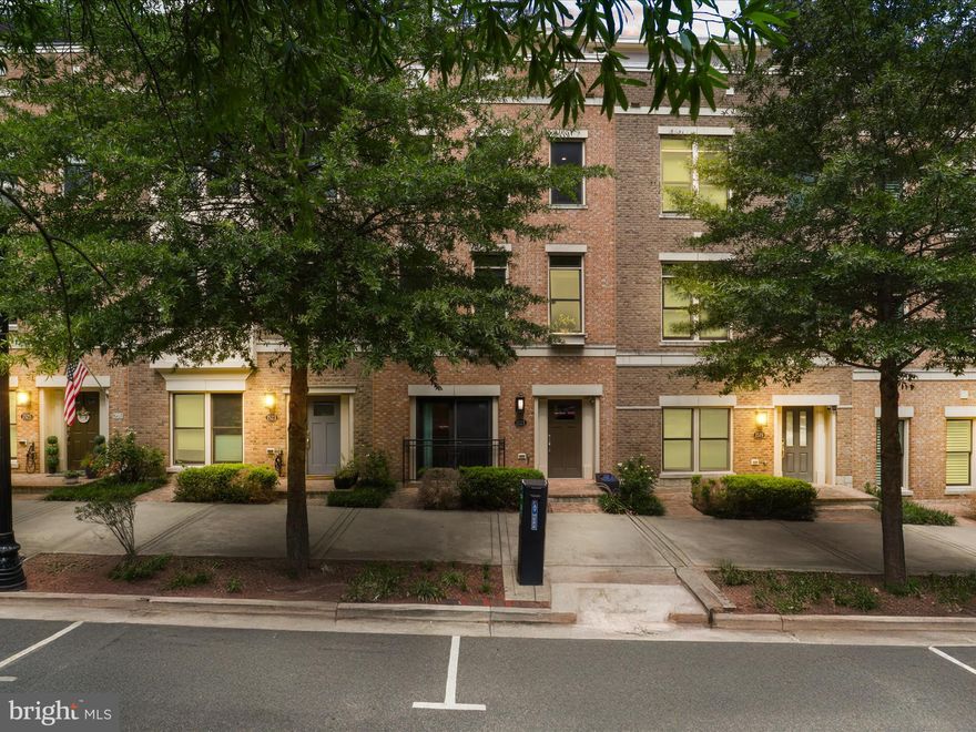 Stunning and fabulous private elevator townhome in the heart of Rosslyn!*3 BR all en-suite with connecting full bath, extra .5 BA on main level with private office, gourmet kitchen w/high-end appliances*upper level loft w/bar*rooftop terrace w/fireplace*hardwoods*2 car garage w/ storage system & flooring*Quiet street in urban setting*Three blocks from the Rosslyn Metro*Walk to grocery, restaurants and the Potomac River*Near communities of Courthouse, Clarendon & Georgetown*Commuters dream to DC, Arlington, I-66, 495*Come home to Rosslyn Key!