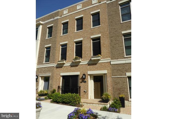Stunning and fabulous private elevator townhome in the heart of Rosslyn!*3 BR all en-suite with connecting full bath, extra .5 BA on main level with private office, gourmet kitchen w/high-end appliances*upper level loft w/bar*rooftop terrace w/fireplace*hardwoods*2 car garage w/ storage system & flooring*Quiet street in urban setting*Three blocks from the Rosslyn Metro*Walk to grocery, restaurants and the Potomac River*Near communities of Courthouse, Clarendon & Georgetown*Commuters dream to DC, Arlington, I-66, 495*Come home to Rosslyn Key!