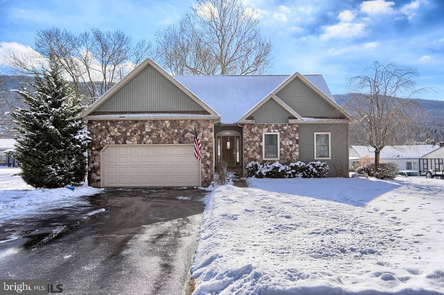Enjoy easy, one-floor living in this beautiful 3 bedroom, 3 bath ranch home nestled on nearly half an acre offering magnificent views from every angle. Step through the front door and be greeted by the light & bright family room boasting 9' cathedral ceilings and a gorgeous fireplace. The chef of the home will fall in love with the kitchen featuring granite countertops, gorgeous cabinetry, and sleek stainless appliances. Wander down the hallway to find the spacious owner's suite complete with trey ceilings, a walk-in closet, and a gorgeous ensuite with dual vanities, a soaking tub, and walk-in shower. Two additional bedrooms and a full bath complete the first floor. The finished lower level is ideal for hosting guests with its full kitchen and living areas, a murphy bed, as well as a full bath, and laundry room. Additional highlights include hardwood floors throughout and a patio area with a fireplace. You don't want to miss out on this fantastic home!
