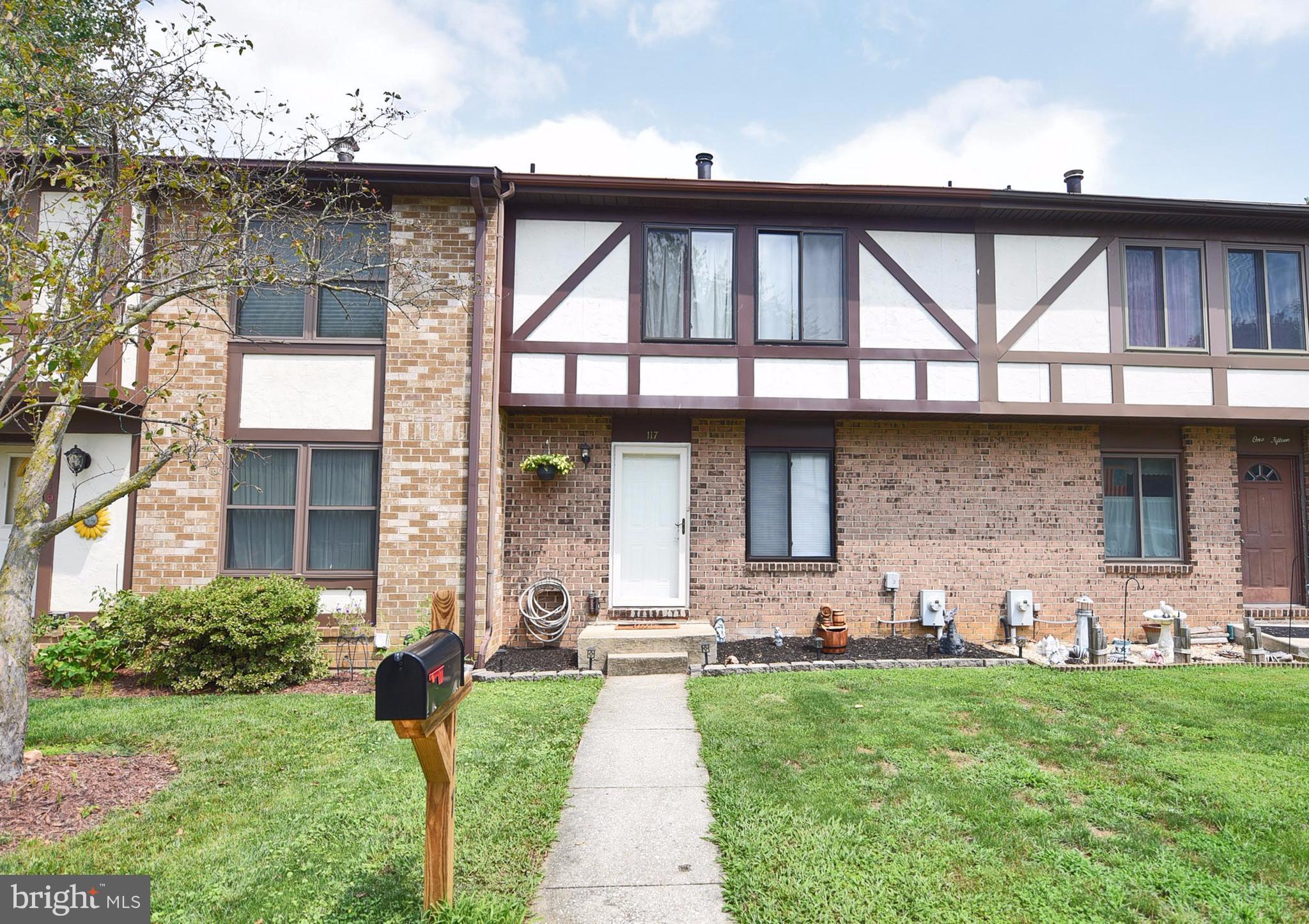 Nicely updated Tudor style Townhome. New SS appliances, sep dining area leading to large living room w/pellet stove. Spacious master bedroom w/attached master bath & 2 sizable bedrooms. Fully finished lower family room on walk out level to covered patio. Wood deck overlooking huge fenced-rear yard, opening to common area. Fresh neutral paint, brand new carpet & replacement windows w/6 panel doors.