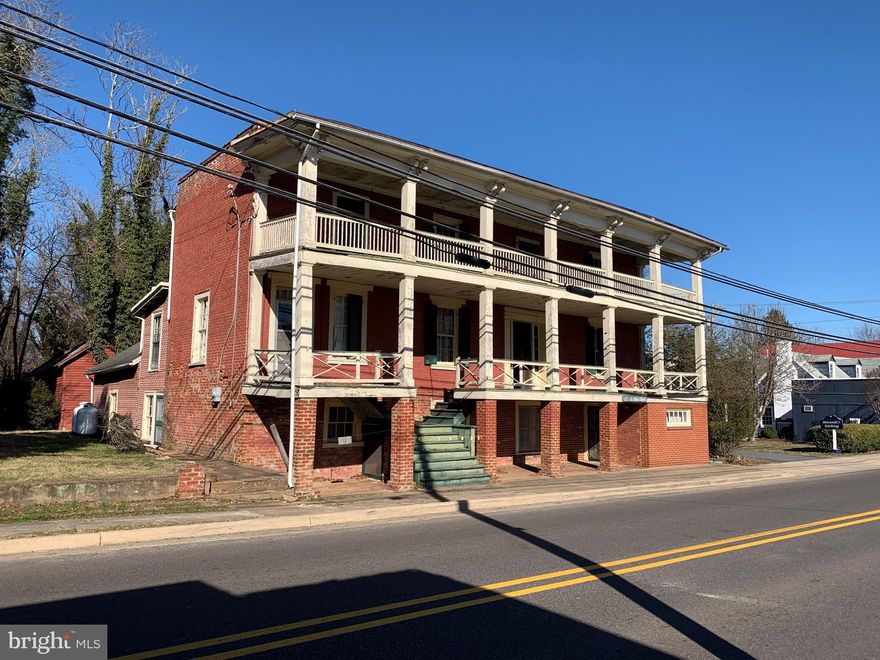 Subject property includes three Tax Maps 39A-83,84&85A. The Hunton House, later named the Hunton Hotel, was originally, constructed in 1803+-. Over the years there were additions to the original footprint. Today the Hunton Hotel, has approximately 8,694 finished square feet, under roof. There were nine original fireplaces, on three levels. The original circa 1803 portion, was constructed of brick. Later additions had wood siding and stucco. The interior, walls were constructed of wood and plaster. The Hotel has partial hot water, oil fired heat, no air conditioning, and is served by public water and sewer. Zoned B-1 Commercial. The property is in fair to poor condition, and is in need of restoration. The location and architecture has the prospect of being a prominent feature and destination in the Town of Madison. Miranda's Restaurant - this property is one of the oldest buildings in the Town of Madison, of log home construction, dating back prior to 1800. The property was originally a residence of the John Lewis family, in 1880, who later moved next door to the Hunton House, prior to becoming a hotel. Later additions were constructed in 1940's. The current use is Miranda's, a casual dining restaurant. It is served by public water and sewer. Central heat pump for heating and cooling. Total square footage 2,320+-, and is zoned B-1 Commercial. There is a detached 336 square foot, commercial improvement, formally used as a coffee shop, adjacent to the restaurant, and also facing Main Street. In the back of the property there is a wood-framed barn of 3,376+- square foot, that is currently being used for storage. Also is a vacant lot of 0.054 acres.
