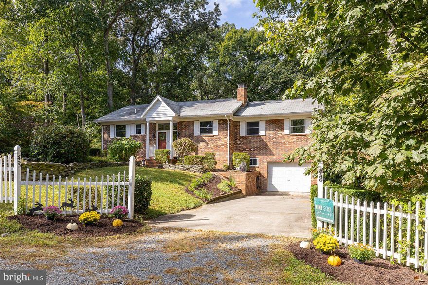Step into this newly renovated gem nestled in the highly sought-after Blue Ridge Shores community! Located in the heart of Louisa county, this exclusive gated neighborhood boasts a pristine lake, ideal for boating, fishing, and swimming. With an impressive 5 miles of shoreline, a spacious beach, boat launch, play area, volleyball and basketball courts, and a charming picnic spot, there's no shortage of outdoor activities to enjoy.

Indulge in the breathtaking winter water view from the primary suite, just a quick two-minute stroll along the enchanting wooded path maintained by the HOA.

This stunning all-brick, two-level home has been meticulously updated, offering generously sized rooms including 3 bedrooms and 2 full baths. With fresh paint and newer carpeting throughout, the interior exudes a sense of modern elegance. Cozy up by one of the two fireplaces during chilly evenings, or unwind on the expansive patio adorned with a charming pergola. Additional features include two sheds for ample storage, a convenient central vacuum system, and an updated kitchen that will surely impress.

Whether you're seeking a permanent residence or a vacation getaway, this home is ready to welcome its new owner with open arms. Don't miss out on this incredible opportunity!

Updates are as follows - HVAC 2015 converted from oil to Gas, Roof approx. 12 years, Windows 2010, Hot Water Heater August 2023, Kitchen remodeled in 2016 to include refacing of cabinets, marble countertops, new flooring this year, updated appliances,  Washer/Dryer 2016, Water Softener 2016, 

Large shed is 12 x 18 & has window A/C unit,  Second shed is 10 x 12
Two fireplaces - lower level is propane, upper is wood burning
Window air conditioner is supplemental use only.