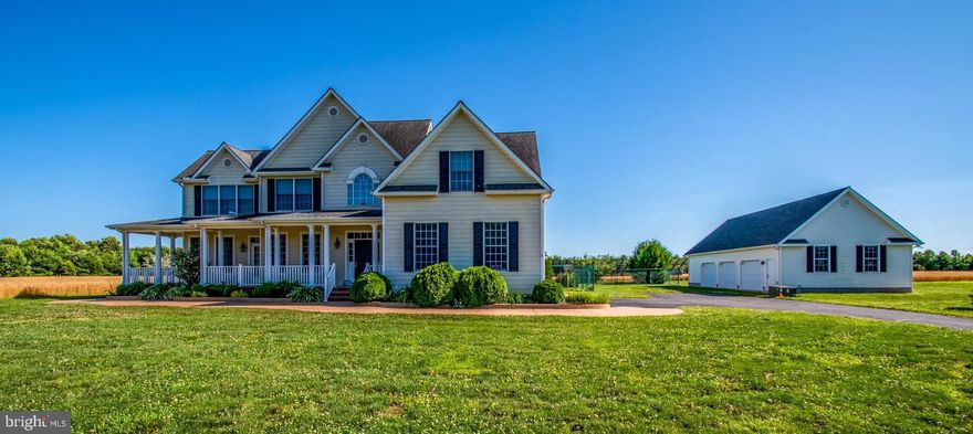 Welcome Home!!Must see this Spacious 2 story home w/ 5 BR, 2.5 Bath. Move in Ready!! An open foyer with wood flooring awaits you as you enter the front of the house. Lots of Windows to Capture every angle of the peaceful and tranquil Cleared 7 acre yard. Two Heat Pumps, Programmable Thermostats. Large Gourmet Eat in Kitchen with Silestone counters, Maple Cabinets,  Island,  tile floor, Like New May Tag Appliances, and plenty of pantry space is the heart of the main floor, large Den, separate Dining Room/Office and a spacious Sun Room all flow into the kitchen. In house access to the 2 car attached garage. A wooden stair case takes you upstairs to a Master BR w/ Sitting Room which could be made into a large master closet,  Master Bath w/ Double Sinks, Spa Tub and Shower. Four more spacious bedrooms await you down the hall along with a Full bath with Double Sinks.  Laundry Rooms on the main floor and 2nd floor is furnished with 2 Maytag washers & 2 Maytag dryers included, laundry hook ups in the garage as well.  Large Detached 3 Bay 1200 Sq Ft Garage,  doors open on both sides of this huge space. Great Space for extra vehicles, tinkering or friendly gatherings. The back yard has a very large fenced in area for your little ones and pets.   A stamped cement  walkway goes all the way from the front of the house to the great back yard patio for cook outs and entertaining. Enjoy a relaxing sunset on this spacious front porch. This property sits on 7 acres total of cleared land and is very peaceful and quiet.  Lots of opportunity for Farming, A Swimming Pool, Horses,Farm Animals, Out Buildings. you can Build that Big Entertaining Barn for Gatherings and enjoying the great outdoors. Detached Solar Panels which are generating money back to the owner. This property is located close to Downtown Centreville, very close to Rt 301 and 20 minutes from the Bay Bridge and 30 minutes from Middletown, De.  5 Minutes from downtown Centreville where you will find quaint shops, Restaurants, grocery Stores. The Public Doc which goes into the Corsica River is just 5 minutes away. NO HOA, very lenient covenants.