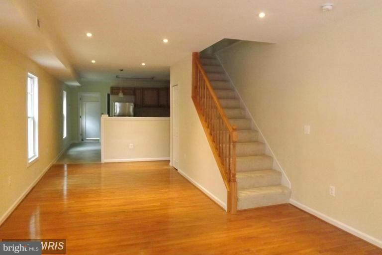 This town home has been totally renovated featuring HW floors, granite counter-tops, upgraded cabinets spacious 3 spacious bedrooms and finished attic that could possibly be a recreation room or plenty of storage. Great buy for an investor or buyer. Call today to inquire or view.