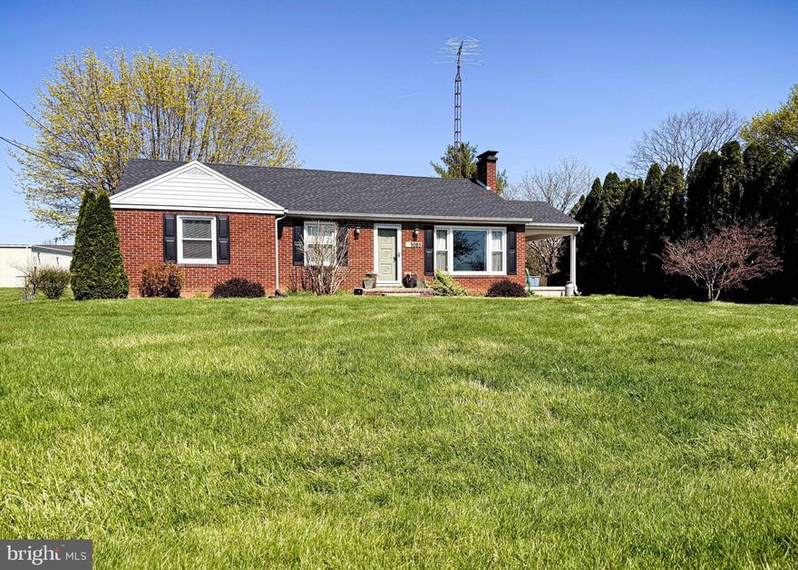 Nestled in the heart of Marion, this charming 3-bedroom, 1-bathroom brick rancher offers the perfect blend of convenience and tranquility. Located on Main Street, you'll enjoy easy access to nearby highways while benefiting from the quiet, quaint atmosphere of the town. The home features a large bay window, a remodeled kitchen, a brick fireplace, and beautiful hardwood floors. The basement provides ample storage space, and the detached garage is ideal for parking your vehicles and working on projects.