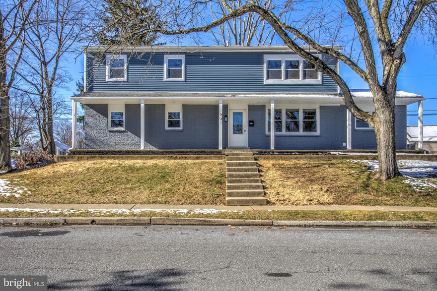 Welcome to a charming, fully renovated, and SPACIOUS 5 bedroom/3 full bathroom (!!!) home with attached two-car garage - all nestled on a quiet street in central Reading! Minutes from major highways and close to everything, this single family home features a spacious and flexible main floor layout, an incredible primary suite, and an attached garage - all on a charming corner lot! All new everything - windows, efficient HVAC system, as well as fresh paint, flooring, and fixtures mean you can move right in with no concern for maintenance! Entering from the charming front porch, you’ll love the entrance into the bright living room with brand new, cozy carpeting that continues throughout, as well as the oversized windows looking over the front lawn. The open concept space is perfect for gathering with family or entertaining friends, and flows seamlessly into the dining space, and brand new kitchen beyond. You'll note many high-end upgrades in the kitchen such as stylish white cabinetry, stainless steel appliances, tile backsplash, and durable quartz counters. From the sliding glass door off this area, access the completely rebuilt rear deck - allowing views into the serene rear yard which is partially fenced and lined with mature trees. In addition, direct interior access to the two-car garage from the kitchen space maximizes convenience. Off the living room is a large, separate multi-purpose room which can be used as an office, playroom, den, etc. and houses a convenient space for main floor laundry. Rounding out the main floor is a desirable, well-sized first floor bedroom. Adjacent to the bedroom is a brand new full bathroom with lovely luxury vinyl plank floors and a stunning double vanity and tiled tub/shower combination. Upstairs, a highlight is the impressive primary suite. You will love the very spacious size, huge walk-in closet, and brand new ensuite bath with gorgeous double vanity and tiled walk-in shower. This level also features three additional well-sized bedrooms, as well as a second full bathroom with tub/shower combination and another double vanity. The basement level provides ample clean storage space, and direct access to the garage via a second set of stairs. Enjoy peace of mind in this home with the brand new, efficient HVAC system, new water heater, new windows throughout, as well as all mechanicals updated to code. Charming, spacious, no maintenance, and easy to show - contact us today!
