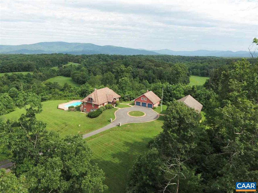 Private, 22 acre estate with long frontage on the Mechums River, 2-acre stocked pond, and two top-quality homes where every room highlights the fabulous panoramic views of the surrounding mountains and country side. The 6511 sq.ft. main house is constructed with some of the best materials and methods found in residential housing anywhere in the world. Technology from US, Europe, Canada, Japan, and China are combined to create a highly efficient, green, healthy home with the best in modern conveniences both inside and out. The 2300 sq.ft. guest home offers similar quality construction with residential quarters on upper level and a conference center with adjacent office on lower level. 3-bay garage has office above. See documents 4 details.