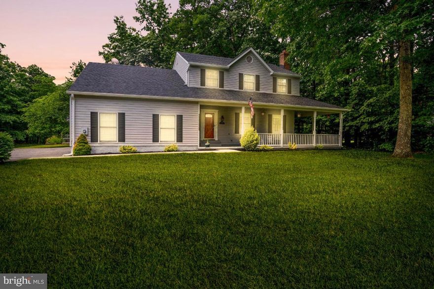 Buyer financing fell through!  Don't miss your second chance to be the proud new owner of this beautiful home that just appraised for $460k!  This two-story Colonial is located on a quiet cul-de-sac and sits on a one-acre lot.  Featuring updated kitchen and bathrooms, spacious bedrooms, and spectacular outdoor living space.  Relax on the beautiful custom patio with fire pit, or on the front wrap-around porch.  The main level has a living room with fireplace, a large dining room just off the kitchen - great for entertaining or holiday dinners, a family room with an exit to your patio, and a side loading, two-car garage.   All three bedrooms are large with lots of storage space.  The master bedroom has a walk-in closet and a newly renovated en-suite with a separate tub and shower.