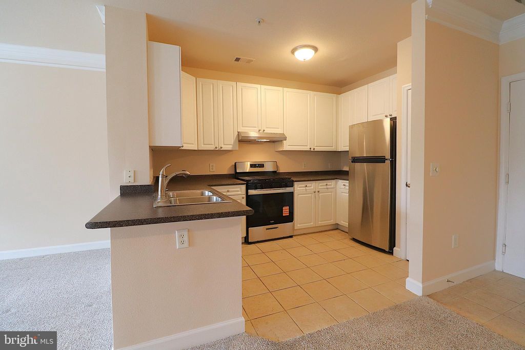 Photo of 501 Hungerford Drive #137, ROCKVILLE, MD 20850 (MLS # MDMC2200764)