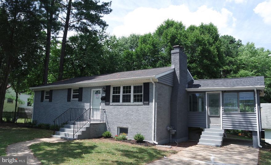 Gorgeous Remodeled Raised Rambler, 4 Br, 3 Ba, Brand New Kitchen w/ Granite Counters, New Cabinets, S. S. Appliances, Sun Room Off Kitchen, HW Floors, Updated Custom Design Bathrooms w/ Italian Ceramic Tiles, Finished Basement w/ 1Br,  Full Bathroom, & Additional Room, 2 Fire Places, Large Family Room, New Flooring, Roof, HV/AC, Conveniently Located near DC, Andrews Airfare Base, +++ Must see.