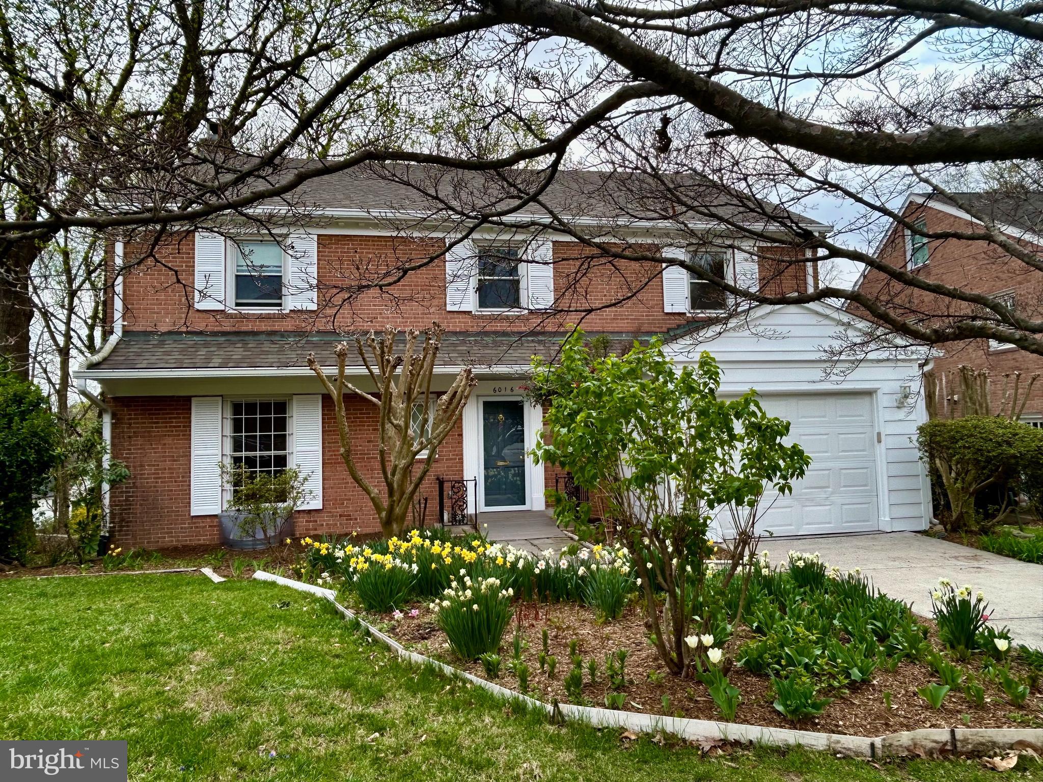 ((Update: PENDING - Multiples in first 12 hours. Thank you agents and buyers.)) Bring your big ideas. Perched atop a quiet street in one of Bethesda's most naturally beautiful neighborhoods, 6016 Onondaga Road delivers space along with incredible potential. This six-bedroom, four-and-one-half bath brick colonial enjoys treetop views and tremendous upside.
Inside, classic architectural bones are ready for your next chapter -- generous room sizes, hardwood floors, crown and decorative moldings, wide doorways, and big windows throughout. The main level offers multiple spaces for entertaining and daily life: a traditional foyer, a formal living room with fireplace, a den or library with built-ins and a wet bar, a separate dining room wrapped in windows, and a large table-space kitchen that invites your personal touch. Direct access from the one-car attached garage makes for easy grocery runs and great flow.
Gorgeous picture moldings line the wall of the staircase to the second floor, setting a tone for warmth and character. Upstairs, the primary suite offers a walk-in closet, en suite bath, and connected sitting room or office with fireplace. Two additional bedrooms share a full hall bath. The top level features two more bedrooms and another full bath -- a rare and valuable layout.
The walk-out lower level brings even more space with an expansive rec room featuring exposed brick, a fireplace, and sliding doors to the backyard. A sixth bedroom, full bath, laundry area, and storage round out the lower level. The private driveway provides off-street parking and room for play.
6016 Onondaga Road is just minutes from the trails, parks, and arts at Glen Echo, the beauty of the Potomac River, and the convenience of downtown Bethesda, Friendship Heights, NW D.C., and major commuter routes.