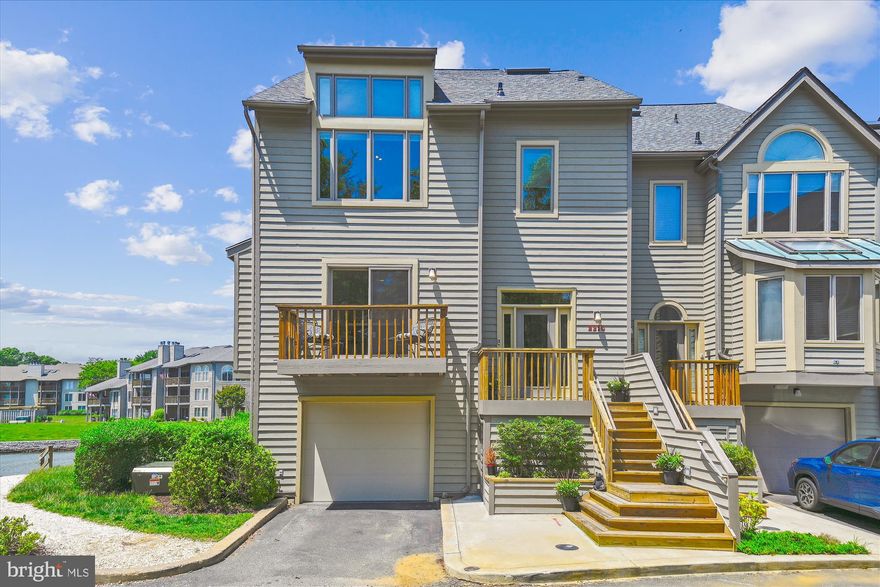 Welcome to your dream home in the highly sought-after Villages of Chesapeake Harbour! This remarkable 4-story townhouse is a true gem. With its expansive living space spanning nearly 4000 square feet above ground, this is one of the largest units available. Step inside and be captivated by the luxurious features and impeccable craftsmanship. This home offers three bedrooms, four full baths, and a convenient half bath on the main level. The attached garage provides ample storage space, complete with built-in cabinets for all your organizational needs. And the best part? Every level is equipped with a private elevator for effortless access and convenience.

Indulge in the serenity of your surroundings with four separate patios/decks to choose from. Whether it's the lower level family room, the inviting living and dining room on the main floor, the kitchen, or the primary bedroom, each outdoor space offers breathtaking water views. With three cozy fireplaces, there’s always a great spot to curl up with a book.  Immerse yourself in the maritime oasis that this home provides, with panoramic vistas of the Bay Bridge, Greenbury Point, and the Chesapeake Harbour Marina.  

Prepare to be wowed by recent renovations valued at over $325,000. The stunning kitchen features top-of-the-line SubZero and Wolf appliances, creating a chef's paradise. The bathrooms have been tastefully remodeled and updated, while new flooring, windows, doors, and even a skylight in a brand new roof elevate the home's elegance.  

Embrace beachside living just steps from your doorstep! This home is perfectly situated within a stone's throw of the community beach and pier, allowing you to enjoy easy access to sun, sand, and the delightful 'Docktails' happy hours. This beachside community offers easy beach access, a community pier, two pools (including a waterfront option), tennis and Pickleball courts, waterfront walking paths, a marina, dockside seating at the waterfront restaurant, Beacon, and 24/7 security. 

Experience the best of coastal living in this vibrant and secure community. Don't miss the opportunity to make this extraordinary property your own. Schedule a showing today and experience the epitome of waterfront living before it's gone!

DONT MISS THE FLOOR PLAN AND 3D TOURS to virtually walk through the home!