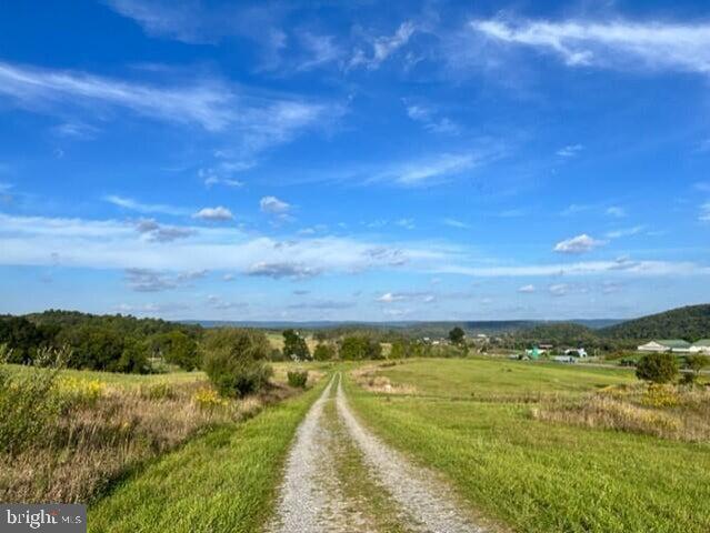 Discover the perfect canvas for your dream home on 5.05 acres of prime land in the serene Shawnee Settlement. This beautiful lot offers breathtaking mountain views and comes equipped with underground utilities (telephone and electric). Although the previous perk test has expired, it's ready for a new evaluation. Don't miss this opportunity to own a piece of paradise!