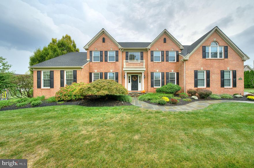 Welcome home to this stately brick front Colonial on  1.4 bucolic acres in beautiful Plumstead Township, Bucks County, PA!  A warm and inviting feeling washes over you as you walk up the meandering slate walkway with fresh landscaping and upgraded lighting package, showcasing the twilight curb appeal. Inside, you are greeted with gleaming wood floors in the two-story foyer, flanked by the living and dining rooms, both with custom moldings. The updated chef's kitchen in the heart of the home has all the modern high-end amenities, and an open floor plan to the family room, recently updated with clean modern lines around the fireplace and custom moldings and woodwork, making this space ideal for entertaining, Tucked away is a main floor office, a generously sized laundry room, powder room and a three car garage. Upstairs, the owner's suite is an oasis with a sitting area, generous closet space and a spacious master bath. Three more bedrooms and two more updated bathrooms make this home the ultimate in comfort and luxury. Also featuring a full finished basement with gym, game room and media room, and a covered rear deck with slate patio and built in gas grill, and a park like back yard. This home has so many versatile spaces to fit your desires.  All this located in the top-rated Central Bucks School District, Central Bucks East High School, Tohickon Middle and within walking distance to highly regarded Gayman Elementary School, this home is a perfect 10! Newer Roof and Windows, public sewer and well water, this home has it all! Conveniently located near Doylestown and New Hope for shops and restaurants, an easy commute to Philly and NYC. A perfect place to call home!